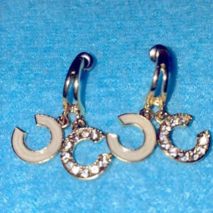 CC rhinestone and enamel gold tone pierced earrings chic and effortless dangles